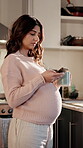Pregnant, woman or coffee with phone in kitchen for fetal development info, maternity research or scroll. Hot beverage, future mom and smartphone in home for pregnancy app, prenatal advice or texting