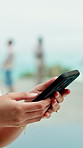 Hands, phone and holiday with typing for travel, weekend and scroll break. Hotel, summer vacation and person with tech for influencer, social media and connection with app and luxury resort review