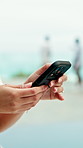 Hands, phone and holiday with scroll for travel, weekend and communication. Hotel, summer vacation and person with tech for influencer, social media and connection with app and luxury resort review