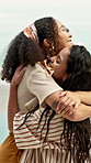 Hug, outdoor and women with smile, holiday for weekend break and bonding together. Happiness, friends and people with embrace, summer vacation and reunion with tropical island, tourism and ocean