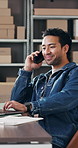 Ecommerce, man and laptop in office with phone call, logistics discussion and update for delivery. Happy, person and conversation in workplace with computer, contact or courier feedback for shipping.