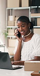 Phone call, laptop or black woman in office for shipping, distribution schedule or talking. Tech, entrepreneur or speaking to client for ecommerce order, typing email and smile in small business