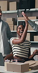 Smile, people and high five with laptop for delivery, distribution or quality control for ecommerce. Small business, warehouse and collaboration for supply chain, shipping or supplier sales success