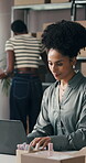 Woman, online and typing with laptop for logistics, small business and stock distribution on website. Shipping, entrepreneur and person with tech for supply chain, smile and plan for goods delivery