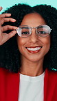 Happy woman, face and optometry with glasses for eyesight or fashion on a studio background. Portrait, female person or model with smile, style or accessory for optic lens, frame or vision care
