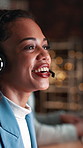 Call center, agent and woman with headset in office, night and explaining offer for lead generation. Telemarketing, bokeh and happy person with mic for discussion, coworking or working late for sales