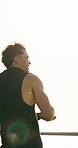 Thinking, man and fitness with rest, back and challenge for health benefits, space and wellness. Outdoor, athlete and person with break, happiness and exercise with reflection, workout and view