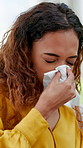 Sick, woman and blowing nose in home with tissue, health problem and flu symptoms from fatigue. Tired, person and allergy in house with toilet paper, virus and mucus congestion from sinus infection.