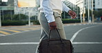 Walking, city and business man with bag in street for morning commute, travel and journey. Pedestrian, corporate and legs of person on trip for work, career and professional opportunity in town