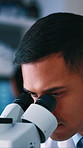 Man, scientist and research with microscope in lab for experiment, analysis and medical study. Male person, machine and testing sample for biotechnology, genetic engineering and vaccine development