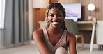 Face, funny and black woman in home, workout for health benefits and exercise for wellness. Apartment, relax and African person in lounge, laughing and smile for commitment and fitness with break