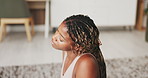 Yoga, stretching and black woman in home, fitness for health benefits and wellness. Apartment, yogi and African person in lounge, energy and exercise for peace, morning routine and movement on floor