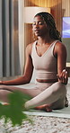 Black woman, breathe and meditate for yoga at house with chakra, inner peace and mindfulness. Female person, lotus pose and inhale for wellness, spiritual healing and self care with holistic balance