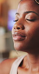 Happy, woman and meditation in home with breathing exercise, stress relief and peace for reflection. Zen, black person and inhale in apartment with mindfulness, wellness or smile for holistic health.