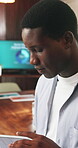 Tablet, reading and research with business black man in office for planning, schedule agenda or report. Networking, email review or connection with person in agency for digital checklist and feedback