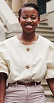 Black woman, face and happy in city on commute with confidence, outdoor and travel for real estate job. African person, smile and realtor in urban town with pride for property development in Kenya