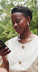 Outdoor, businesswoman and happy with phone for chat, stylist and communication with taxi on website. Fashion advisor, smile and black person with mobile for cab update, online and travel to work