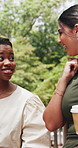 Happy women, business and discussion to work in park for outdoor commute, travel or trip together. Female people, employees or colleagues talking with smile for coffee break, social or conversation