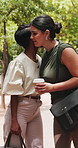 Happy women, hug or meeting with greeting in park for business commute, travel or goodbye. Female people, employees or colleagues with embrace or outdoor farewell for work trip, completion or respect