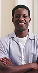 Happy, business and face of black man with crossed arms, confident and pride for advertising agency. Professional, office and portrait of person with smile for brand consultant, campaign or marketing
