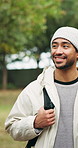 Smile, man and hiking with friends outdoor for travel, discussion and trekking adventure. Happy, people and talking in nature for backpacking holiday, communication and gathering for weekend getaway