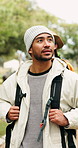 Walking, hiking and man in nature for thinking, vacation and sightseeing on adventure with friends. Trekking, reflection or person outdoor to explore woods, tourism or travel on holiday with group