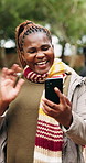 Happy, black woman or wave with phone for video call, conversation or friendly chat in outdoor park. Female person, user or smile with hello or greeting on mobile smartphone for discussion or app