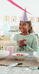 Happy, birthday and child with cake and applause for celebration, gathering and special day outdoor. Family, excited and girl with candles, balloons and streamers for cheering, milestone and dessert
