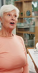 Consultation, clipboard and old woman in clinic, discussion and appointment for medical service. Nutrition checklist, patient and person in hospital, conversation and feedback for healthcare info
