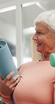 Elderly, woman and weightlifting with dumbbell or physiotherapist for muscle rehabilitation in clinic. Senior, female person or discussion with therapist for recovery, health or wellness in hospital