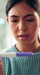 Regret, pregnancy test and woman on sofa in home with stress, upset or mistake for unplanned maternity. Anxiety, scared and female person with positive result for failed birth control in house.