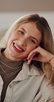 Face, woman and relax with smile in home for weekend break, peaceful morning and free time. Portrait, calm person and happy in apartment for comfortable rest, positive attitude and unwind on day off