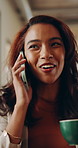 Woman, smile and phone call with coffee cup in office, hallway and contact at media company. Person, happy and mobile communication with consulting, drink or insight with talk at creative agency