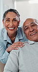 Face, doctor and old man with smile in clinic, medical support service and elderly care specialist. Portrait, gp and senior patient with consultation for wellness checkup, laughing and healthcare