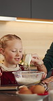 Mom, child and flour with oil in kitchen for baking recipe or ingredients together in home. Mother, daughter and learning with junior baker, bowl or eggs for christmas cookies or dessert in house