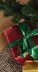 Boxes, present and ribbon at house for Christmas surprise, celebration and holiday tradition. Tree, package and gift with bow for appreciation, secret santa and xmas decoration for festive season 
