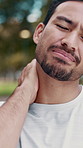 Fitness, man and tired outdoor with neck pain, fibromyalgia symptoms and hurt from difficult workout. Active, person and exhausted with fatigue from intense exercise, sports injury and inflammation.