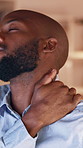 Business, black man and discomfort of neck pain in office from bad posture, fibromyalgia and burnout. Overworked, person and ache from muscle strain, joint tension and inflammation of whiplash injury