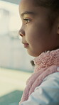 Waiting, thinking and sad with child at window in home for memory, abandoned and foster trauma. Grief, reflection and separation anxiety with girl in apartment for worry, fear and psychology crisis