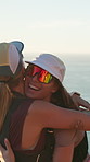Friends, hiking and women in nature, hug and excited for adventure, trekking and exercise. Ocean, hikers and people in wilderness, happiness or training for wellness, workout and embrace with explore