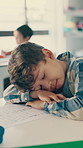Tired, sleeping and kid in classroom at school with burnout for education, learning or knowledge. Fatigue, bored and boy student with nap for rest with development, growth or study at academy.