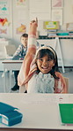 Question, happy and child in classroom at school for learning, knowledge or studying. Help, raised arm and girl student with answer for development, growth or quiz with scholarship at academy.