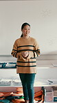 Talking, woman and education with teacher in classroom for students, lesson and college lecture. Professor, academy and curriculum with person on campus for learning, knowledge or school educator