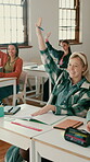 Raised hand, education and smile with students in classroom for learning, question and scholarship. Course, knowledge and academy with people in high school for teenager, problem solving and answer