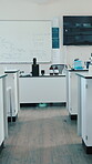 Classroom, empty and science lab in school for education, medical research or experiment for studying. Chemistry, practical equipment or workstation to learn biology knowledge, scholarship or college
