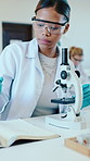 College, chemistry and woman with microscope for notes, science and research project. Students, microbiology and education with notebook, classroom and laboratory with scholarship and knowledge