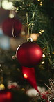 Ball, trinket and tree with bauble for Christmas decoration, celebration and holiday tradition. Bokeh, lights and ornament with sparkle for festive season, xmas event and aesthetic for party at house