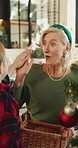 Christmas, high five or family with tree decoration, bonding together or ornament hanging at home. Connection, grandma or kid with success, xmas tradition or child development in festive season.