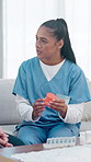 Caregiver, talk and medicine with person in home for dosage, prescription and instructions. Nurse, explain and drugs container for daily reminder, tablets schedule and information for healthcare cure