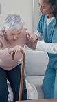 Help, nurse and old woman in home, walking stick for balance and healthcare with wellness. Caregiver, pensioner and person with disability, cane for support and medical recovery with rehabilitation
